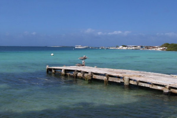 Tropical beach in a beautiful island with sea and boat