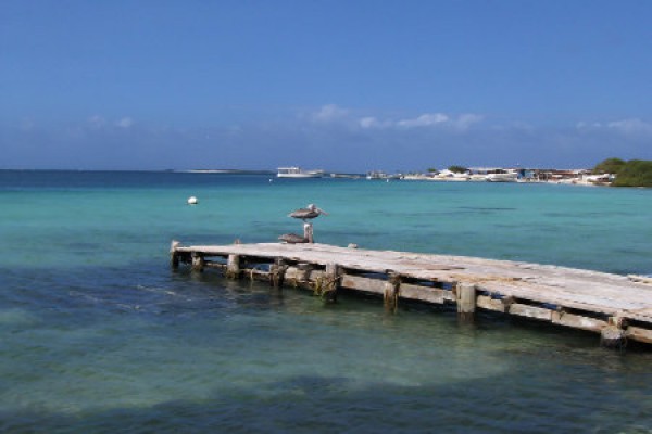 Tropical beach in a beautiful island with sea and boat