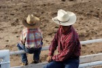 Vater und Sohn beim Rodeo